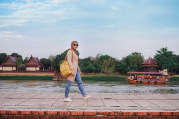 traveler asian muslim woman look and hold in hands map, people planning trip, hipster tourist ,...