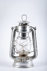Silver kerosene lamp with wick isolated on white background.