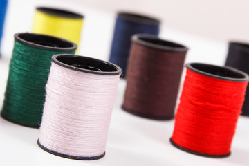 Colorful spools of thread. Accessories for needlework