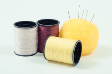 Spools of thread and needle. Accessories for needlework