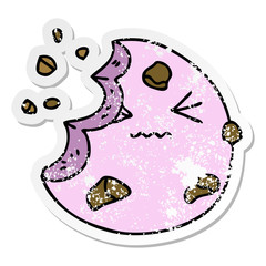 distressed sticker of a quirky hand drawn cartoon munched cookie