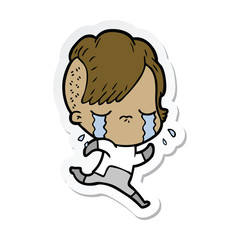 sticker of a cartoon crying girl wearing space clothes
