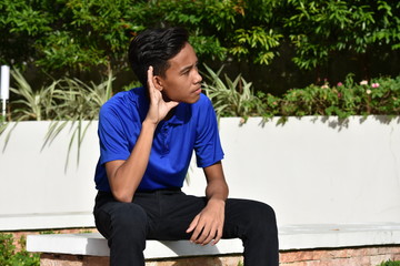 Obraz premium A Minority Boy Listening