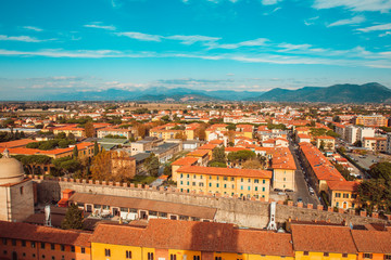 Fototapeta na wymiar Leaning Tower of Pisa and Surrounding Buildings and City of Pisa