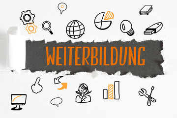 Ein Blatt Papier mit verschiedenen Symbolen und die Weiterbildung