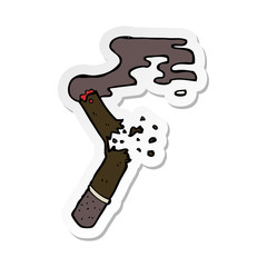 sticker of a cartoon broken cigar