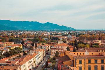 Fototapeta premium Leaning Tower of Pisa and Surrounding Buildings and City of Pisa