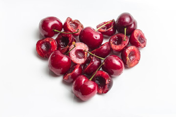 Red cherries in heart shape