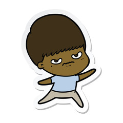 sticker of a cartoon angry boy