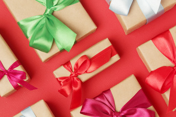 Gifts packed with craft paper and colorful satin ribbons