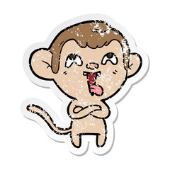 distressed sticker of a crazy cartoon monkey