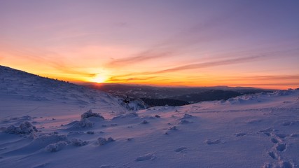 A beautiful church in Ceahlau mountains at sunset, Romania