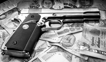 Gun and money