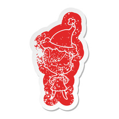 happy cartoon distressed sticker of a girl in cocktail dress wearing santa hat