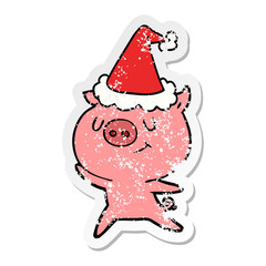 happy distressed sticker cartoon of a pig wearing santa hat