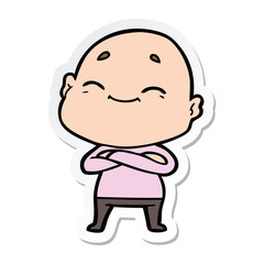 sticker of a happy cartoon bald man