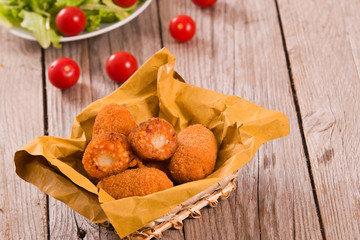 Supplì, italian fried rice balls. 