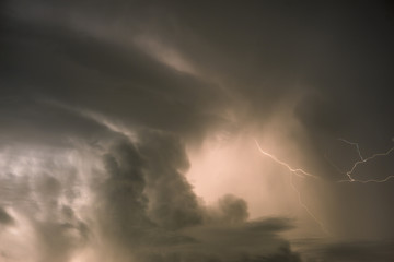 Obraz na płótnie Canvas Lightning in stormy clouds