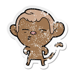 distressed sticker of a cartoon suspicious monkey