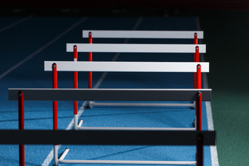 Row of hurdles for sprint training on the lane