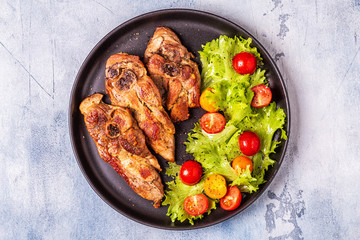 Roasted turkey steak with salad.