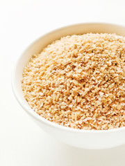 Bowl with wheat groats