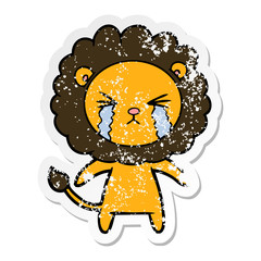 distressed sticker of a cartoon crying lion