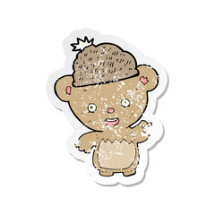 retro distressed sticker of a cartoon bear in hat