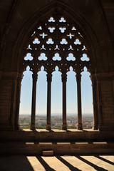 Window of La Seu Vella (The Old Cathedral) with view of Lleida (Lerida) city in Catalonia, Spain, architectural details