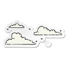 distressed sticker of a cartoon clouds