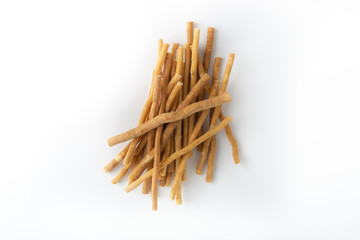 Natural toothbrush Miswak (Kayu Sugi) on white background 