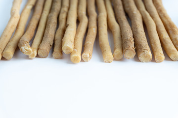 Natural toothbrush Miswak (Kayu Sugi) on white background 