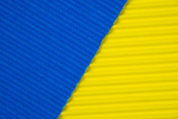Blue and yellow corrugated paper texture, use for background. vivid colour with empty space for add text or object.