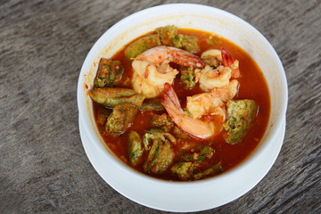 Sour curry with shrimps and vegetable omelet, Thai food.