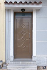 Obraz na płótnie Canvas Metallic brown painted house door