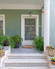 Athens Greece, contemporary house entrance with flower pots
