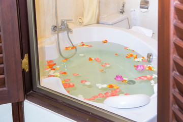 Modern bathroom with rose and lotus petals