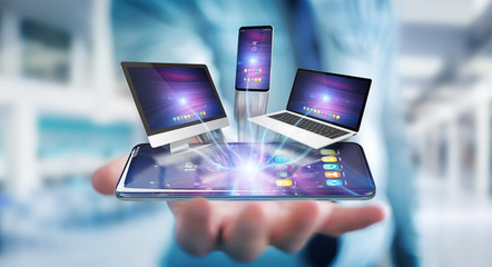 Modern devices connected in businessman hand 3D rendering