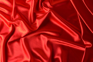 texture, red silk fabric panoramic photo. Silk Duke mood satin - beautiful and regal.