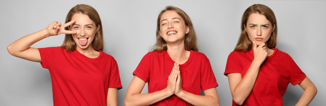 Portrait of funny young woman showing victory gesture on light background