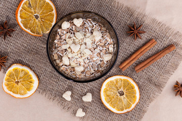 Healthy food. Muesli in a bowl on a light background. Porridge for breakfast on a linen background