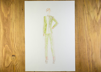 Drawing clothes on paper with a pencil