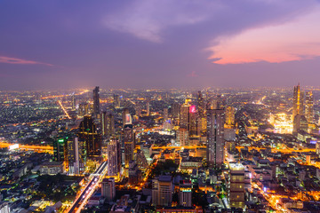 Fototapeta na wymiar high view of the city in sunset time / High view of Bangkok city in sunset