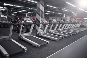 Modern equipment in new gym indoors