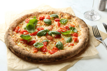 Delicious pizza on table