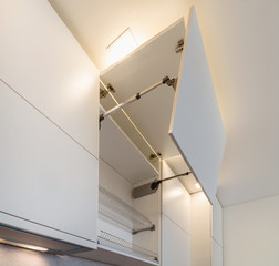 Lift system for tall and wall cabinets