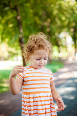 Princess girl blowing soap bubbles with heart shaped, happy childhood concept