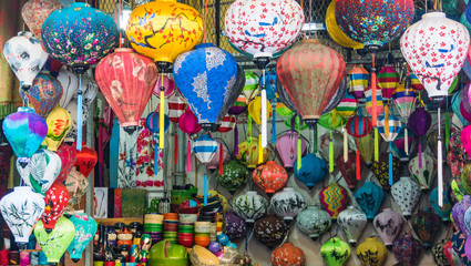 Obraz premium many colors of painted and patterns of silk lanterns on display for sale in shop