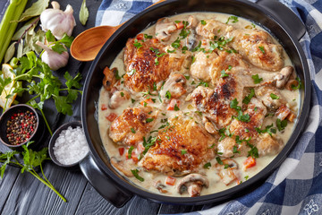 chicken fricassee in a black dutch oven