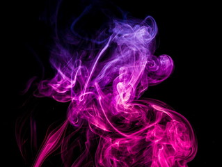 Colored smoke on black background